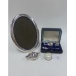 Mixed lot of early 20th century silver items to include egg cup, teaspoon, two napkin rings, oval
