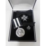 The Order of St John white metal medals