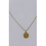 Victorian gold half sovereign coin, 1900, in a 9ct gold mount, on a 9ct gold necklace