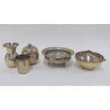 A collection of continental silver items to include two bowls, a beaker, small vase and a jar and
