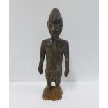 Nigerian Ibeji wooden figure, 23cm high