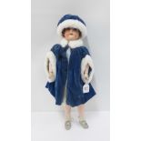 Heubach Koppelsdorf bisque doll with blue sleeping eyes and open mouth, jointed limbs, dressed in
