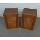 A pair of vintage teak bedside cabinets with slatted doors, 34 x 50 x 32cm (2)