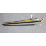 Three 19th century waling canes with ivory pommel and other style handles, longest 107cm (3)