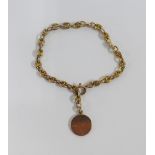Child's yellow metal bracelet with a 9ct gold 'Doris' pendant