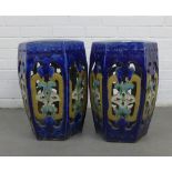 Pair of blue glazed pottery veranda stools, (one a/f with losses to the pierced side) 60cm high (2)