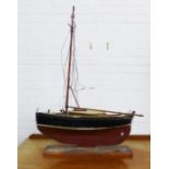 Early 20th century wooden painted half hull sailing ship,on a plinth base, (a/) height 107 x 72cm