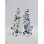 Pair of continental blue and white figures, one a/f, 30cm high (2)