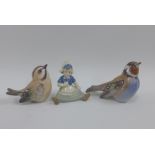 Two Danish porcelain birds and small porcelain figure of a Dutch girl, (3)