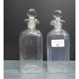 A pair of square glass decanters with stoppers, 21cm (2)