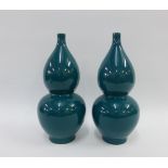 Pair of large Chinese green glazed double gourd vases, with Qianlong seal mark to the base, but