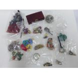 A quantity of costume jewelry to include seed pearl brooch, dress rings, brooches, necklaces, fob