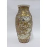 Japanese earthenware vase with figures and stylised motifs, 47cm