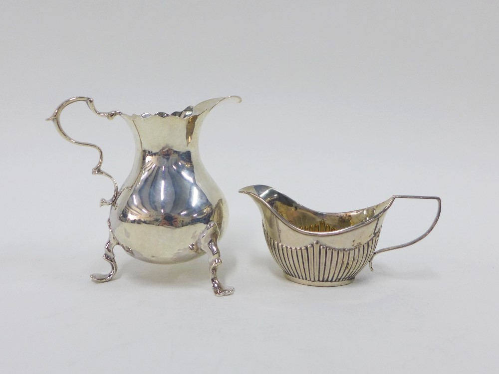 Georgian silver cream jug, rubbed, London hallmarks, 9cm, and a Georgian style silver gilt miniature - Image 2 of 3