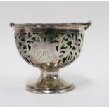 Edwardian silver sugar basket by James Deakin & Sons , Sheffield 1904, with pierced design and swing