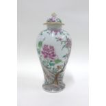 Small famille verte porcelain vase and cover painted with blossom and other flowers, 19cm high