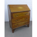 Edwardian mahogany and satin inlaid bureau, the fall front with a shell paterae, opening to reveal a