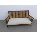 20th century Bergere three seater with three canework back panels, 147 x 80cm