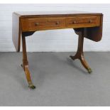 Mahogany and satin inlaid sofa table with two frieze drawers, the side supports terminating on brass