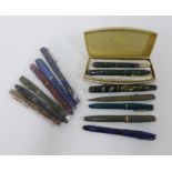 A collection of vintage fountain pens and pencils to include Wyvern, Parker, The Rex and Esterbrook,