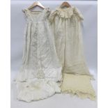 A collection of three vintage christening gowns and a hand knitted shawl (4)