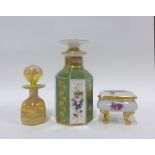 Continental porcelain octagonal scent bottle and stopper together with an art glass cent bottle