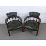 A pair of green vinyl upholstered library chairs with button backs and arms, 62 x 78cm (2)