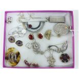 A collection of silver and white metal jewellery to include brooches, necklaces and earrings, etc (a