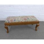 Mahogany long footstool with a crewel work top,