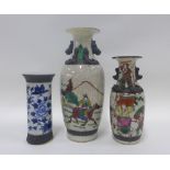 Three Chinese vases with brown incised borders, one with blue and white flowers, tallest 26cm (3)