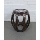 Stained hardwood barrel form stool with a pottery insert to top, 40 x 46cm