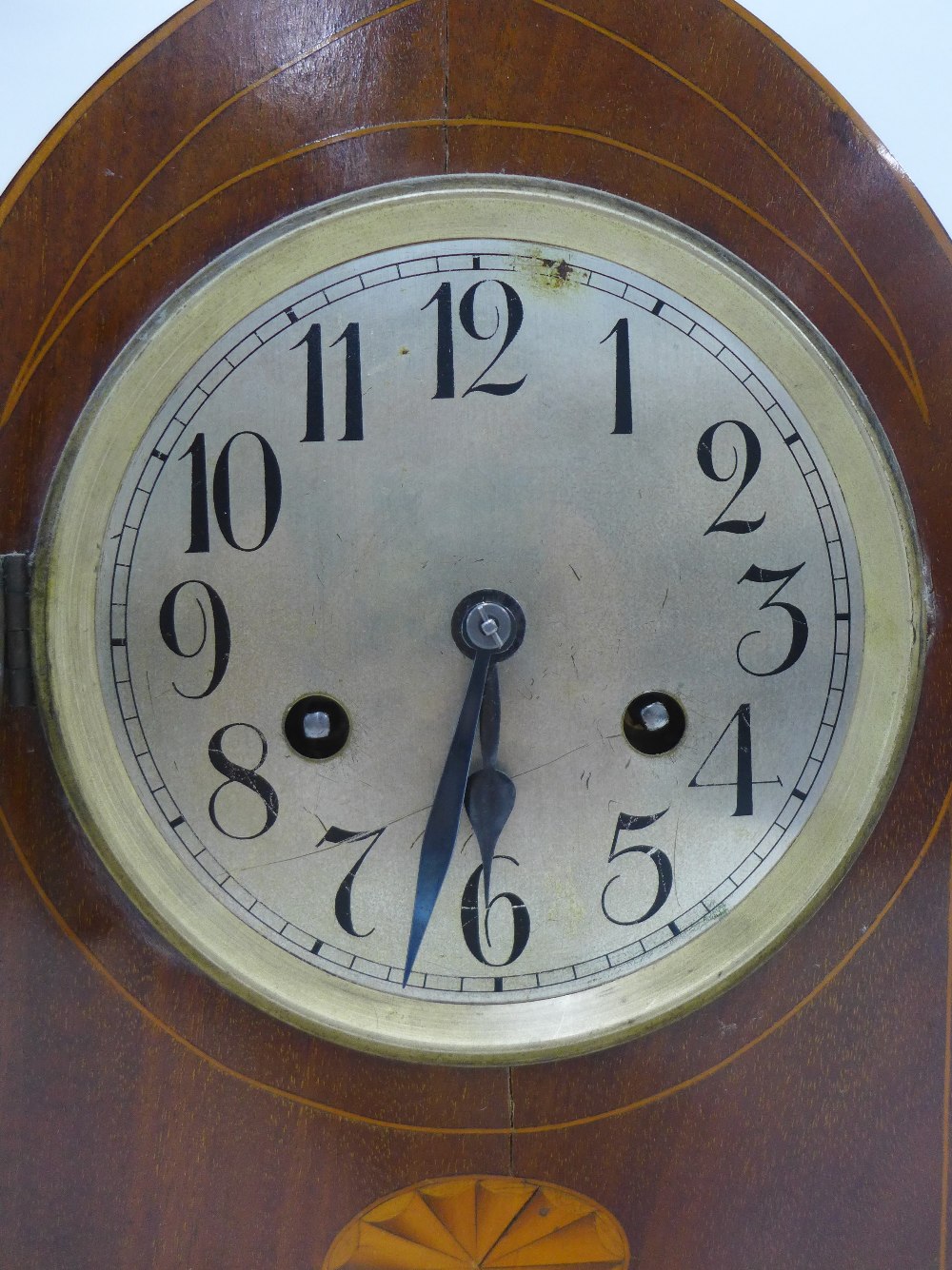 Mahogany cased mantle clock, the arched top over a silvered dial with Arabic numerals, raised on - Image 2 of 3