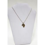 9ct gold and diamond set 'island; pendant on a 9ct gold chain