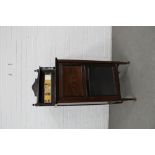 Edwardian rosewood and inlaid music cabinet with a mirrored ledgeback, 55 x 130 x 37cm