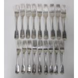 Victorian silver flatware to include nine table forks and nine smaller forks, all with mixed