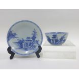 Chinese Nanking Cargo blue and white teabowl and saucer in the River and Landscape pattern, the