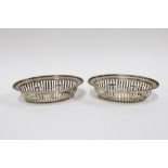 Pair of George V silver bonbon dishes with pierced decoration, London 1931, 11cm (2)