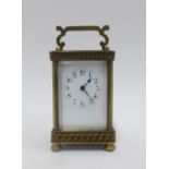 Edwardian brass cased carriage clock with a French movement, 16cm high including handle