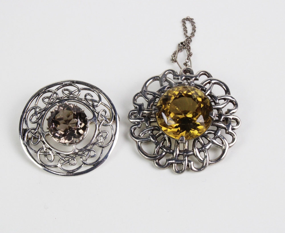 Two Scottish silver citrine brooches, both with Edinburgh hallmarks and one stamped INVSS (2)