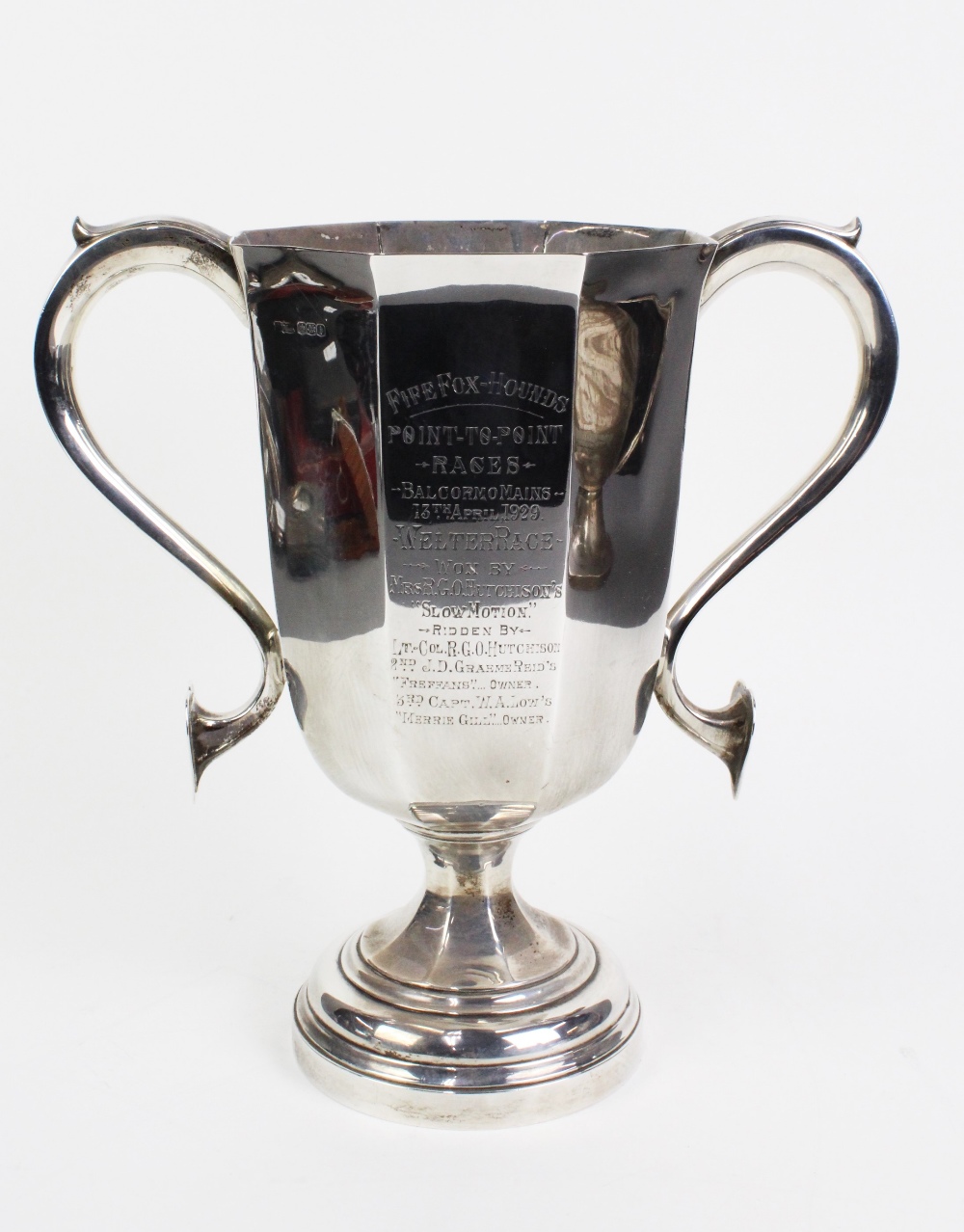 George V silver 'Fife Fox Hound' trophy cup of octagonal form on a pedestal base, the handles with