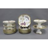 Porcelain dessert service with butterfly and flowers pattern comprising a set of eleven plates,