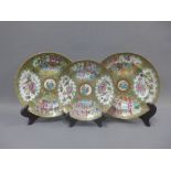 Pair of Chinese famille rose bowls and a matching plate, 24cm (3)