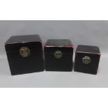A set of three red and black lacquered chinoiserie boxes, largest 25 x 25cm (3)