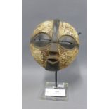 African painted wood face mask, Kifwebe, Congo, raised on a metal stand with perspex base, height