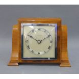 Art Deco walnut cased mantle clock, silvered dial and chapter ring with Roman numerals within square