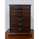 19th century mahogany collectors cabinet / chest, with a rectangular top over six graduating long