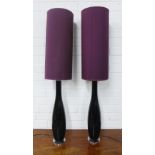 A pair of black glass table lamp bases with purple shades, 56cm high (2)