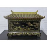 Black lacquered chinoiserie box in the form of a Pagoda, with a removable lid and red lacquered
