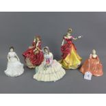 Four Royal Doulton china figures to include Belle HN3703 and Daydreams HN1731 together with a