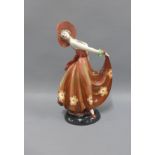 Art Deco continental porcelain figure of a dancing girl, 26cm
